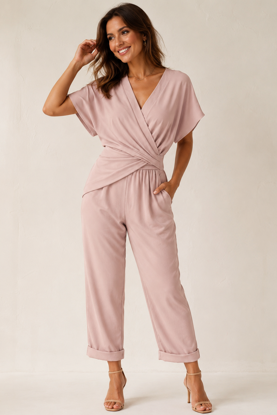 Dames zwarte jumpsuit met korte mouwen, V-hals en wijde pijpen, perfect voor feestelijke gelegenheden. - 4