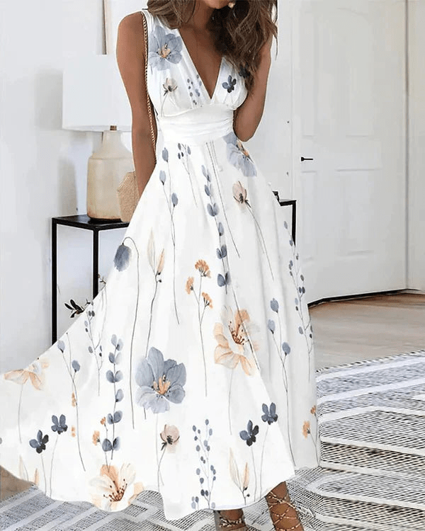 Floral V-hals Jurk – Luchtige Zomerjurk met Bloemenprint en Elegante Pasvorm