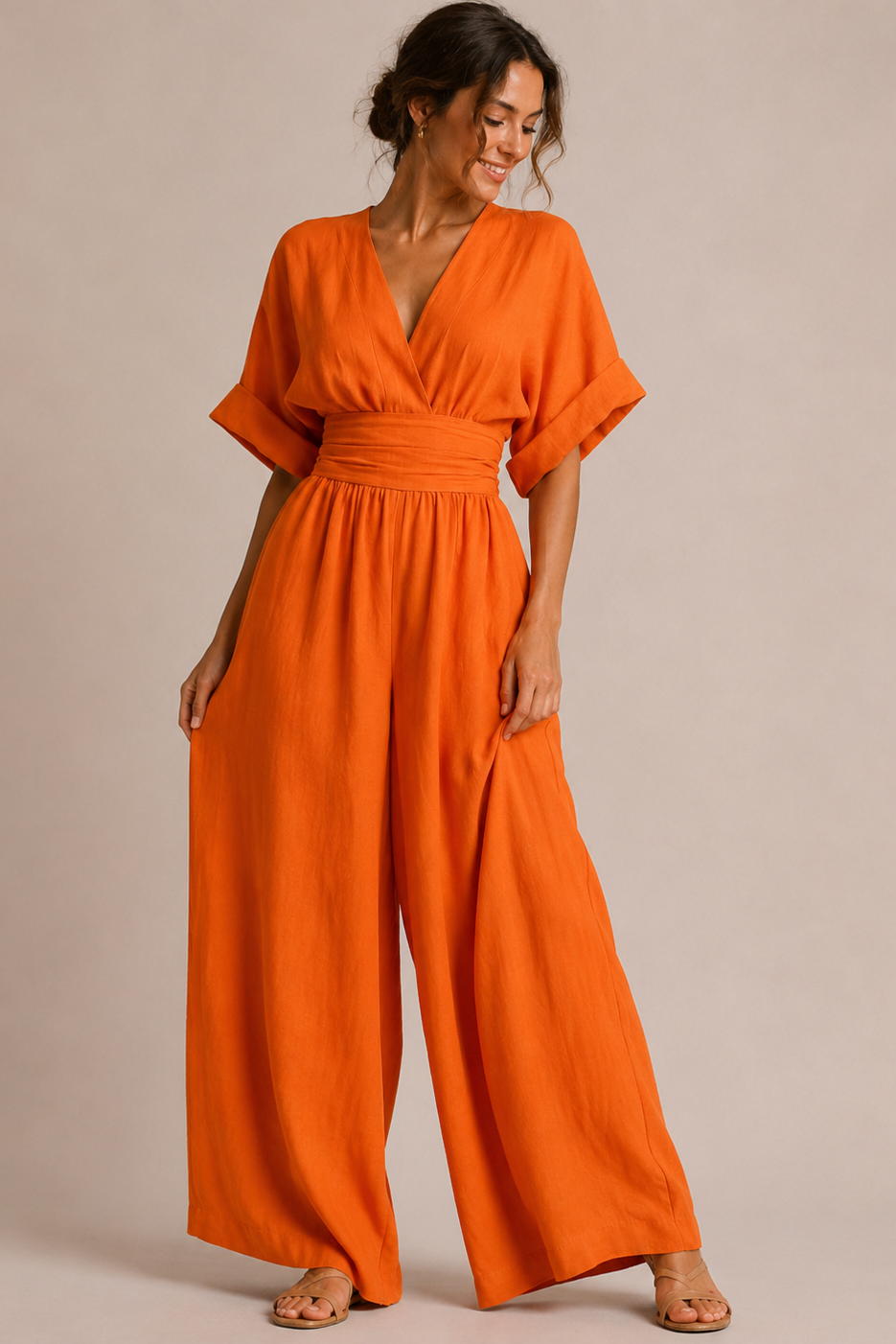 Dames Jumpsuit in zwart, featuring een hoge taille en wijde pijpen, perfect voor feestelijke gelegenheden. - 7