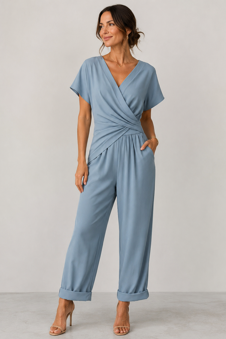 Dames zwarte jumpsuit met korte mouwen, V-hals en wijde pijpen, perfect voor feestelijke gelegenheden. - 1
