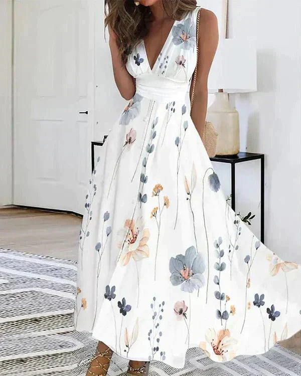 Floral V-hals Jurk – Luchtige Zomerjurk met Bloemenprint en Elegante Pasvorm