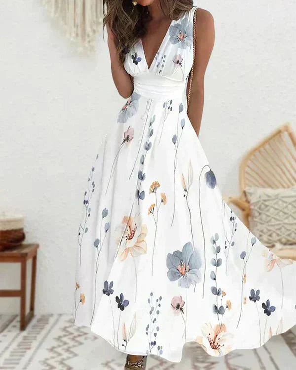 Floral V-hals Jurk – Luchtige Zomerjurk met Bloemenprint en Elegante Pasvorm